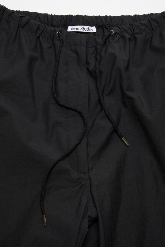 Acne Studios Hose in lockerer Passform Auslauf