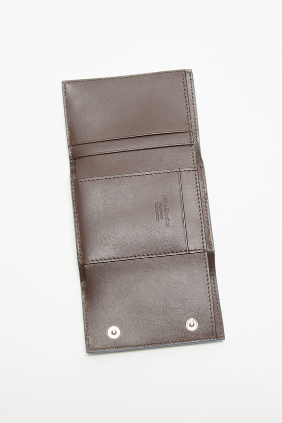 Acne Studios Dreifach-Geldbörse aus Leder Lagerräumung